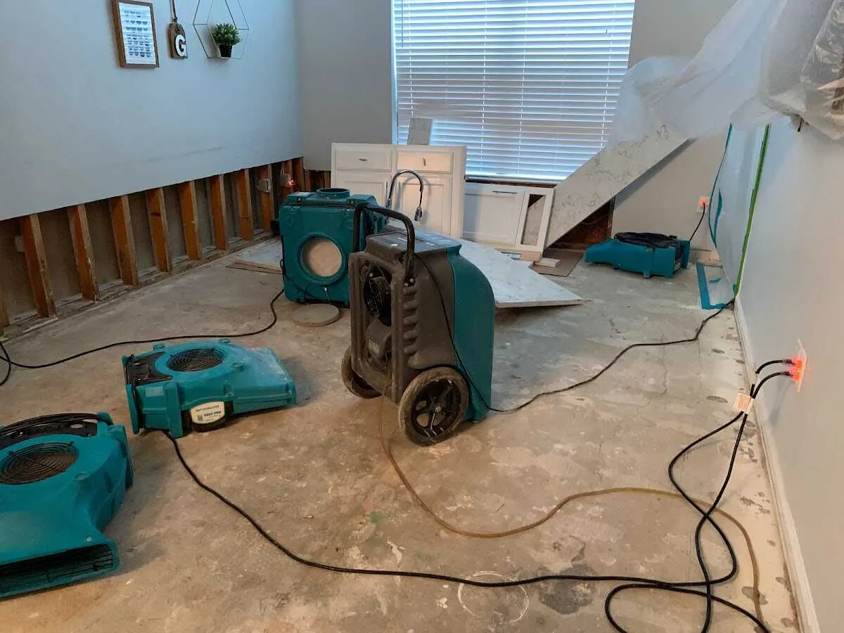 Dehumidifier in flood-cut room for Water Damage Restoration in Woodlawn